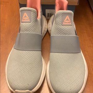 Size 10 grey Sketcher slide-on shoes.